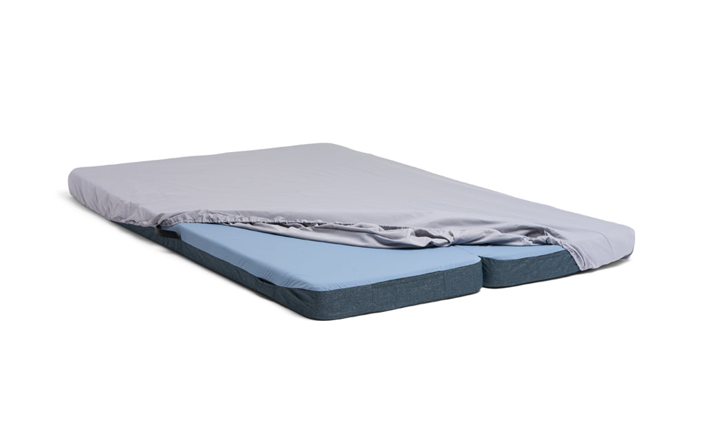 fitted sheet over a double sleeping mat for a van conversion or camping