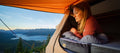 woman on hest camper an sleeping pad